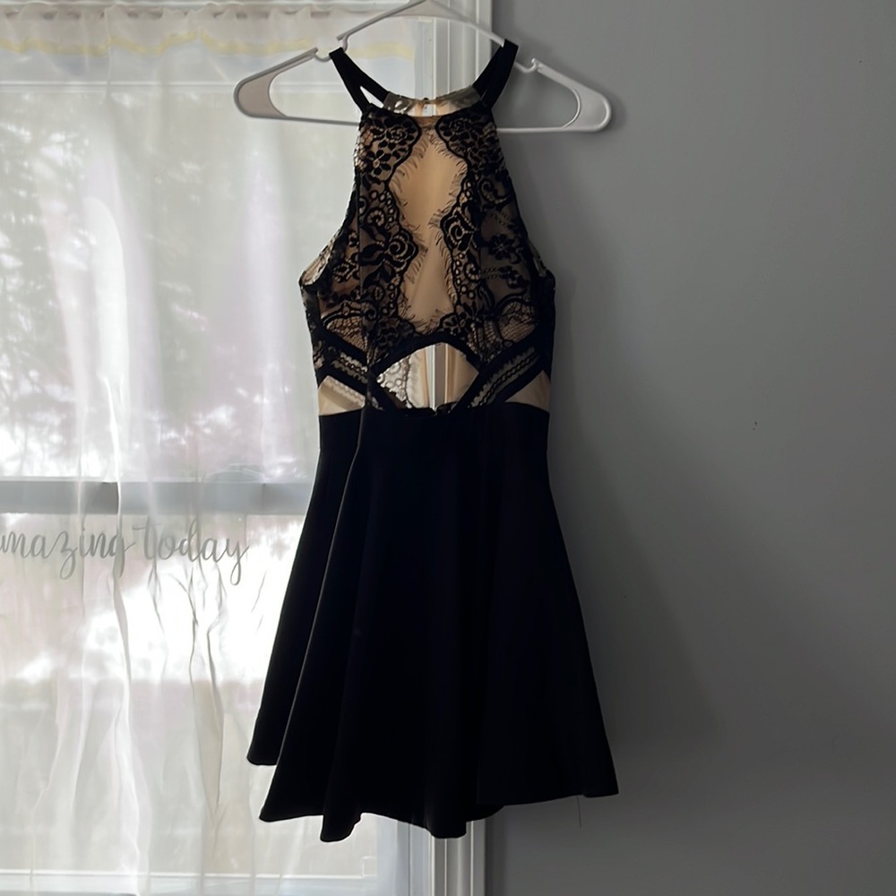 front is skin tone back is see through flowy at the bottom very pretty